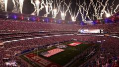 Source-feed image associated with In a border city stadium, US NFL fans sing Canada anthem with gusto