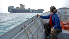 Source-feed image associated with On the Strait of Hormuz, BBC finds seized ships and shark fishermen as uneasy calm returns
