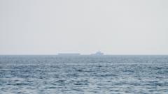 Source-feed image associated with US and Iran trade more strikes in Gulf as fears of escalation mount