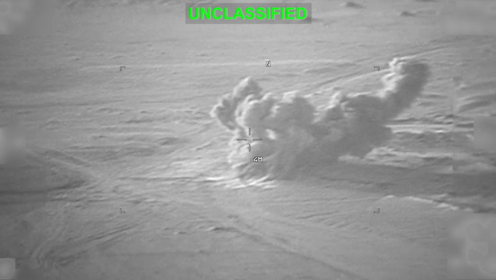 Source-feed image associated with U.S. military says it's carrying out its 10th consecutive night of strikes on Iran