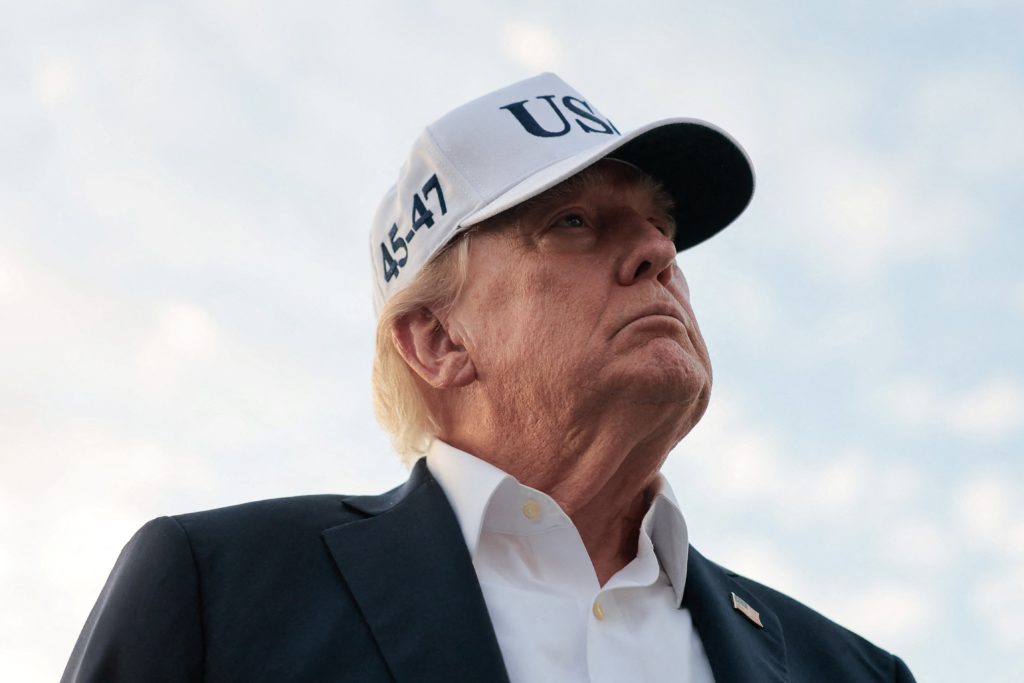 Source-feed image associated with Trump downplays the need to check AI development and says he doesn't want to cede edge to China