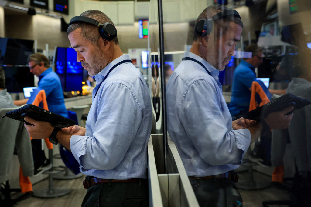 Source-feed image associated with Stocks slip on Wall Street under pressure from rising oil prices, bond sell-off