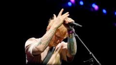 Source-feed image associated with US fans with Ed Sheeran tickets are left 'torn' by Macklemore controversy