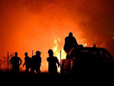 Source-feed image associated with Wildfires rage in Portugal, Greece and Spain while Greek authorities warn of toxic smoke