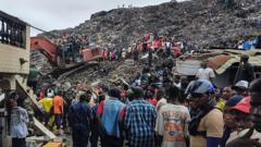Source-feed image associated with Guinea rubbish landfill collapse kills 30