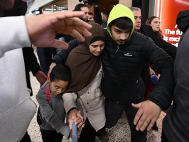 Source-feed image associated with 19 Australian women and children linked to Islamic State group set to return from Syria