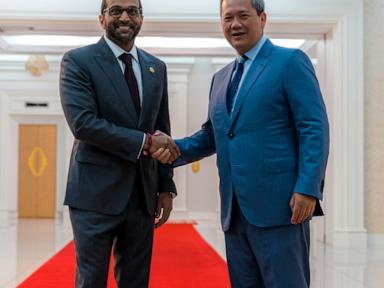 Source-feed image associated with FBI chief hold talks in Cambodia over closer security cooperation to combat online scam crimes