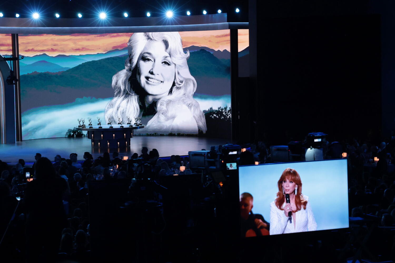 Source-feed image associated with Dolly Parton receives special tribute at the Emmys from Sally Field and Reba McEntire