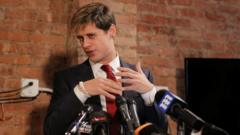 Source-feed image associated with Right-wing commentator Milo Yiannopoulos detained by ICE