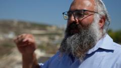 Source-feed image associated with Israeli West Bank settler tells BBC attacks on Palestinians are justified as revenge