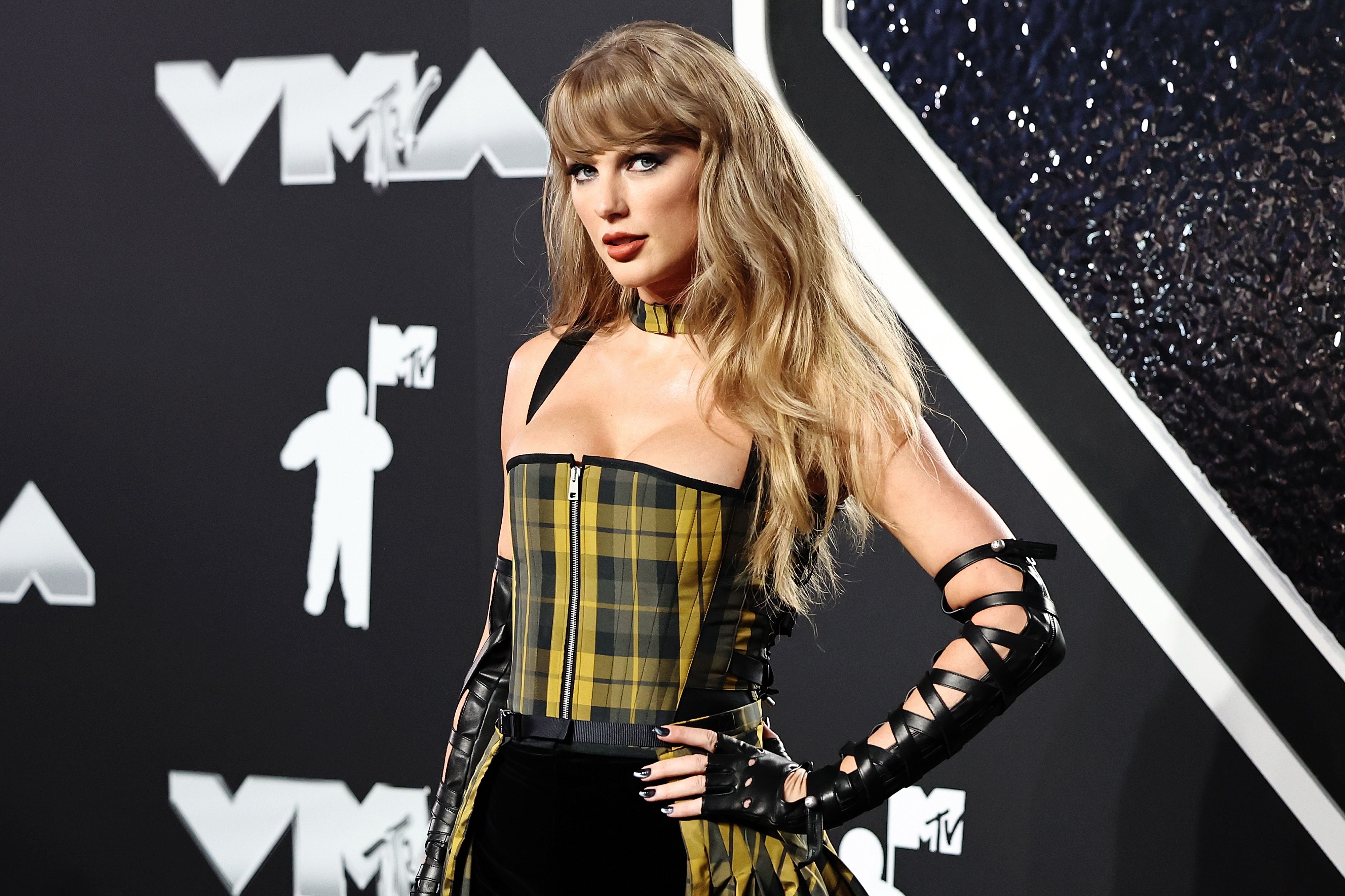 Source-feed image associated with Jonathan Anderson Says Designing Taylor Swift’s Dior Wedding Dress Was “Emotional”
