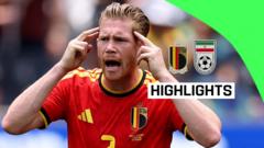 Source-feed image associated with Ten-man Belgium remain winless after draw with Iran