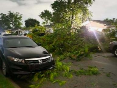 Source-feed image associated with Officials search tornado-damaged areas after strong storms hit Illinois and Indiana