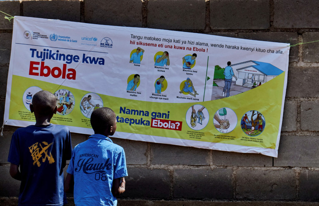 Source-feed image associated with Health workers at center of Congo's Ebola outbreak labor with little pay or rest
