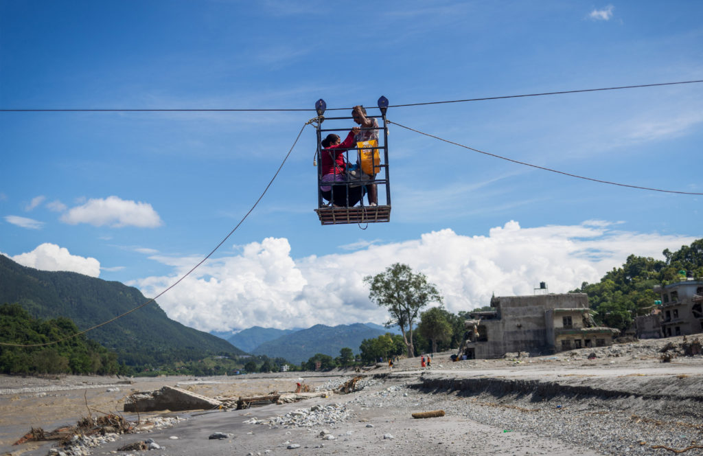 Source-feed image associated with Rescuers in Nepal pull 2 people alive from the debris 10 days after devastating floods