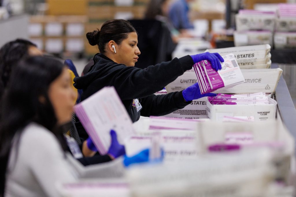 Source-feed image associated with How Trump's attempt to restrict mail ballots is being challenged in court