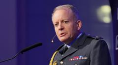 Source-feed image associated with UK forces face operational cuts without more cash, defence chief warns
