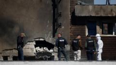 Source-feed image associated with Nato condemns Russian 'recklessness' after drone hits Romanian residential block