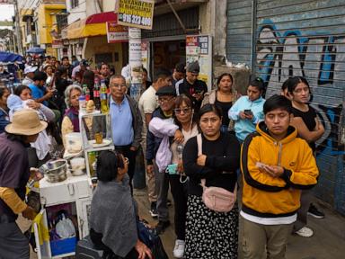 Source-feed image associated with With rising crime on their minds, Peruvians to vote for president yet again