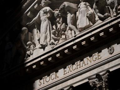 Source-feed image associated with US stocks drift near their records as oil prices rise
