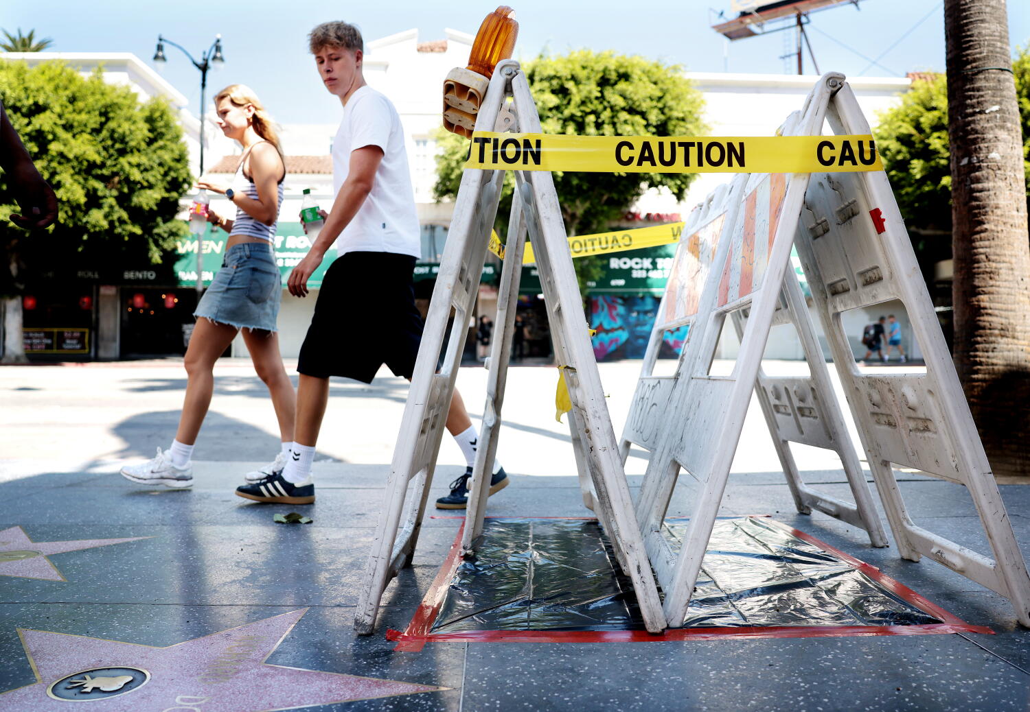 Source-feed image associated with Dolly Parton's Walk of Fame star scratched up days after her death: 'Doesn't make any sense'