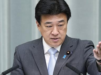 Source-feed image associated with Japan says China has detained 2 of its citizens suspected of smuggling banned items