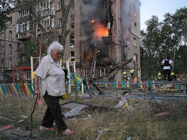 Source-feed image associated with A major Russian attack kills 20 in Kyiv as Ukrainian strikes disrupt Moscow's oil sector