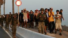 Source-feed image associated with How Spain's migrant crisis created a political storm - whipped up by social media