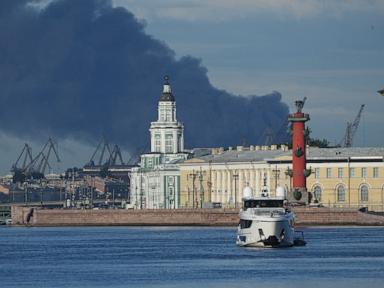 Source-feed image associated with Ukrainian drones set fire to a St. Petersburg oil terminal ahead of Putin visit
