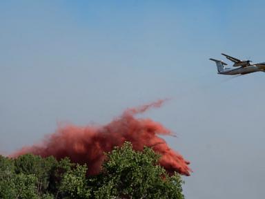 Source-feed image associated with Spain declares an emergency after wildfires force evacuations of 10,000 people