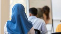 Source-feed image associated with Austria's Islamic headscarf ban in force as under-14s go back to school