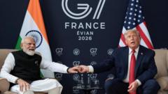 Source-feed image associated with Trump says he will visit India as frosty relationship with Modi thaws