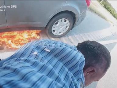 Source-feed image associated with WATCH: Texas officer races to save man from burning car