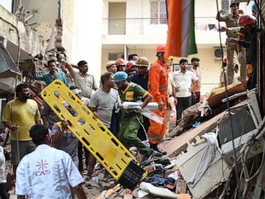 Source-feed image associated with Building collapse in New Delhi kills 1 and traps dozens of others
