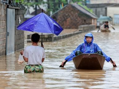 Source-feed image associated with Heavy rain and floods in northern Vietnam submerge homes and disrupt economy
