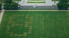 Source-feed image associated with Police investigate '8647' written in grass on US national mall