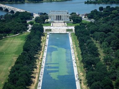 Source-feed image associated with Murky Reflecting Pool draws tourists, but not for reasons Trump wanted