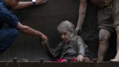 Source-feed image associated with 97-year-old woman rescued after Nepali floods looked like 'a warrior'