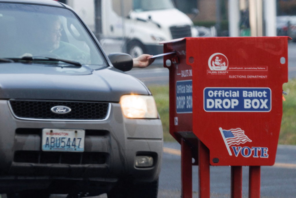 Source-feed image associated with Ballots discounted for late postmarks surged in Washington and Oregon after Postal Service changes