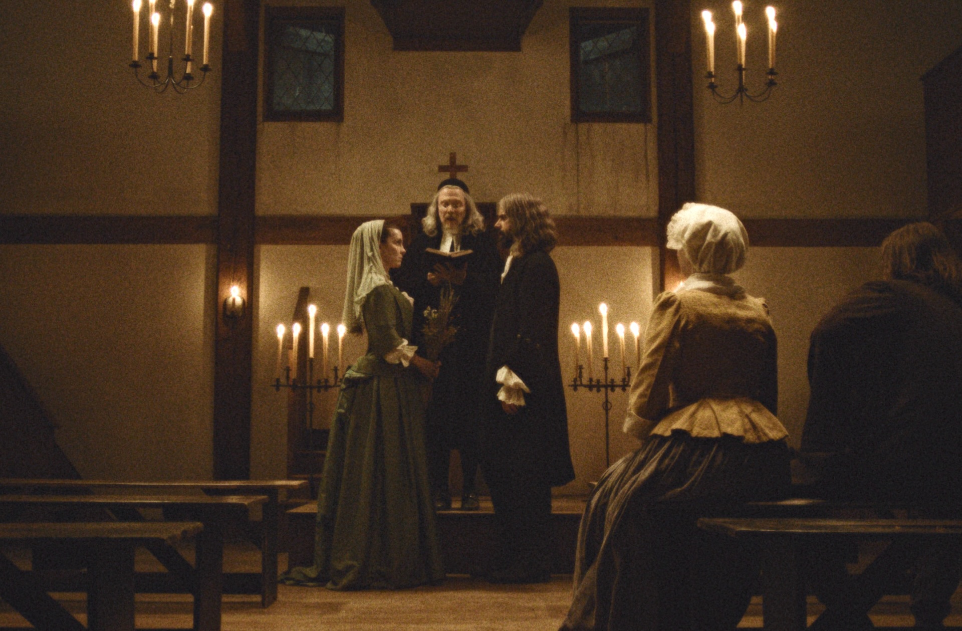 Source-feed image associated with Inside the ‘Widow’s Bay’ Flashback to 1702: How Betty Gilpin and Hamish Linklater Reveal the Town’s Evil Origins