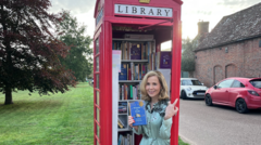 Image from linked report: Winnie-the-Pooh books to fill phone box libraries