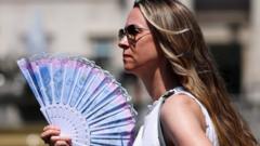 Source-feed image associated with UK sees hottest June day on record as 36.1C recorded in Hampshire