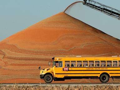 Source-feed image associated with From rural routes to desegregation runs, the yellow school bus faces a new reality
