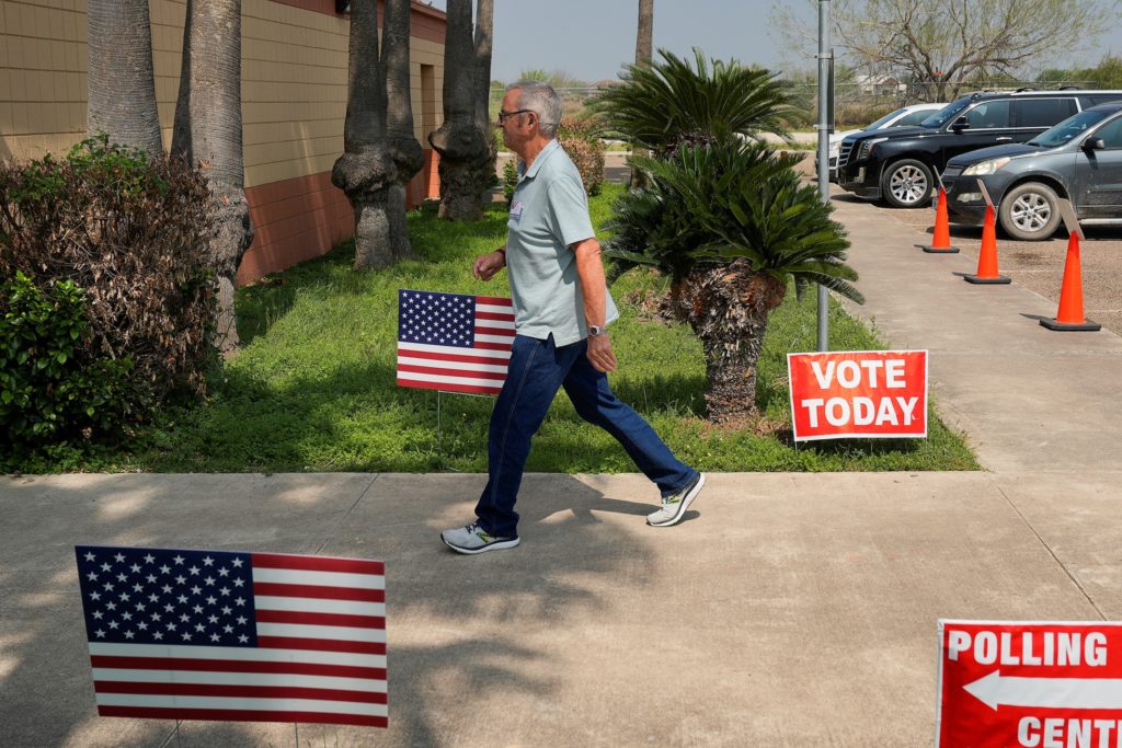 Source-feed image associated with Plan to cut polling sites in major Texas county draws protests as Senate battle looms