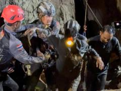 Source-feed image associated with First of five men found alive in flooded Laos cave rescued