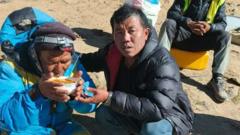 Source-feed image associated with Everest guide survived six-day ordeal by eating chocolate and 'chewing ice'