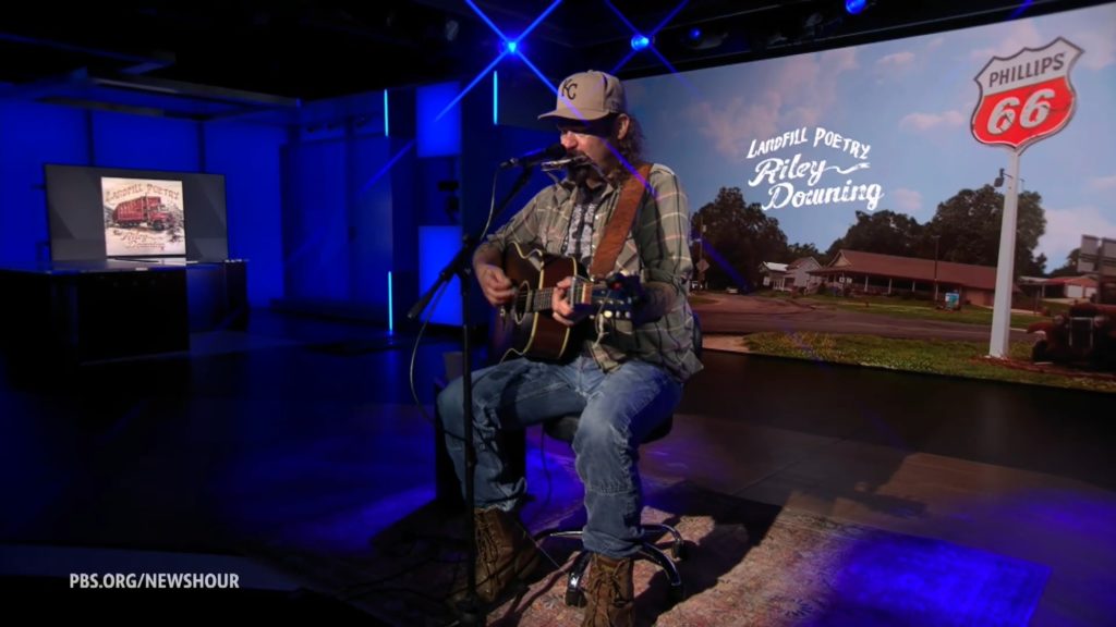 Source-feed image associated with Riley Downing sings about the overlooked corners of American life in 'Landfill Poetry'