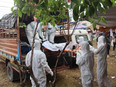 Source-feed image associated with In one Nepal district, flood catastrophe is measured in bodies and burial trenches