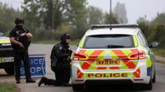 Image from linked report: One of the five men arrested near RAF Fairford called 999 himself