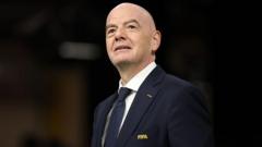 Source-feed image associated with Infantino sorry for errors but stays Fifa president